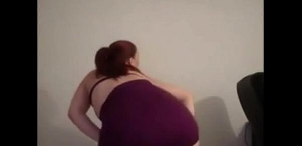  brunette dances in front of webcam